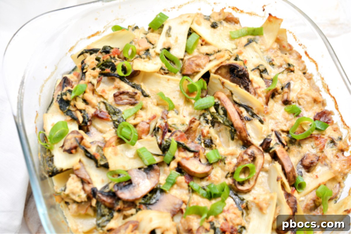 Comforting Keto Tuna Bake 9 Close-up of the creamy, cheesy keto tuna noodle casserole, fresh from the oven, highlighting its comforting appeal.