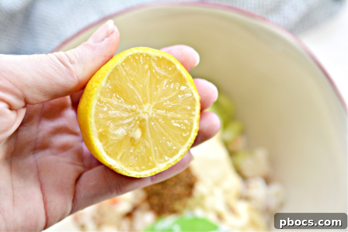 Step 2: Adding celery to the lobster mixture.
