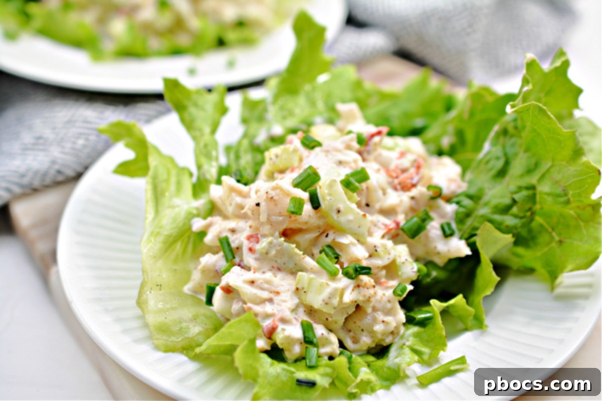 Keto Lobster Salad served inside a halved avocado for a quick lunch.