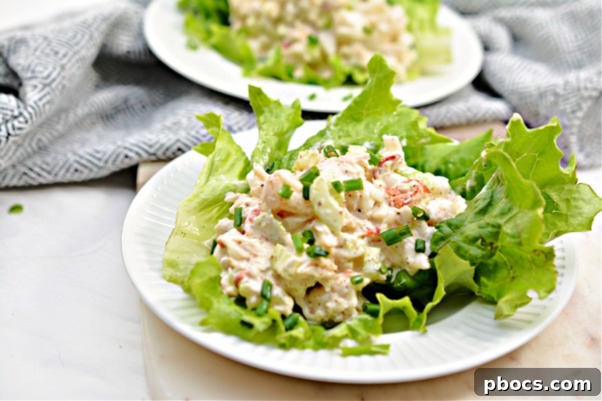 Keto Lobster Salad served on a large green lettuce leaf, ready to eat.