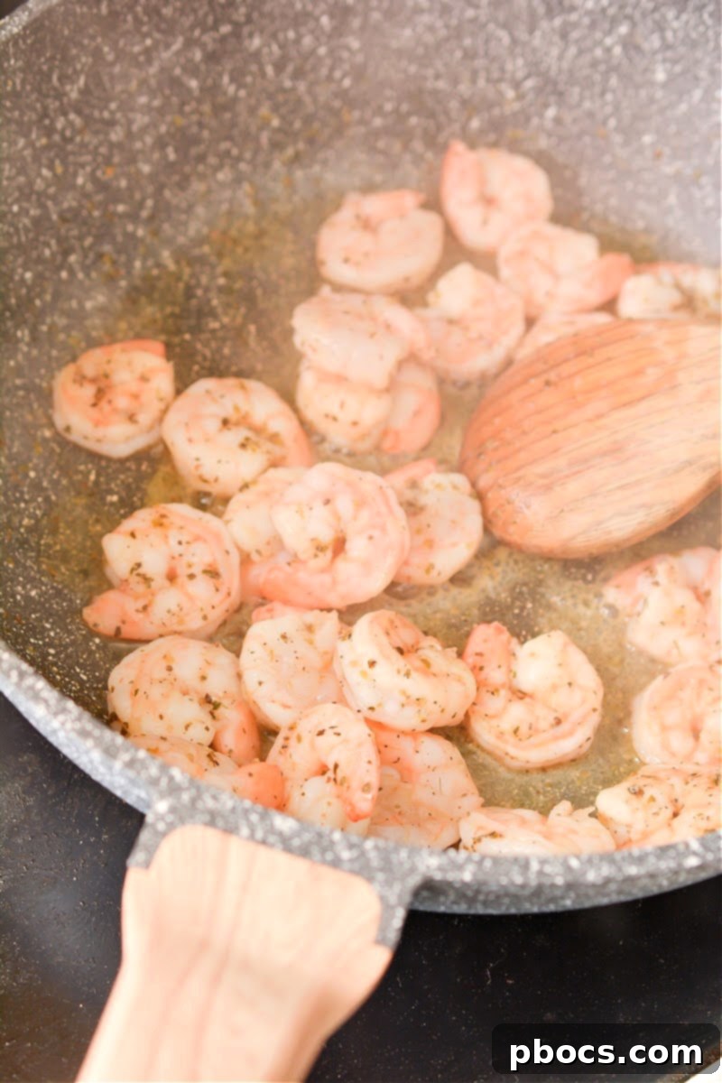 Ultimate Creamy Keto Garlic Shrimp 11 Sautéed shrimp removed from the skillet, ready for the creamy sauce