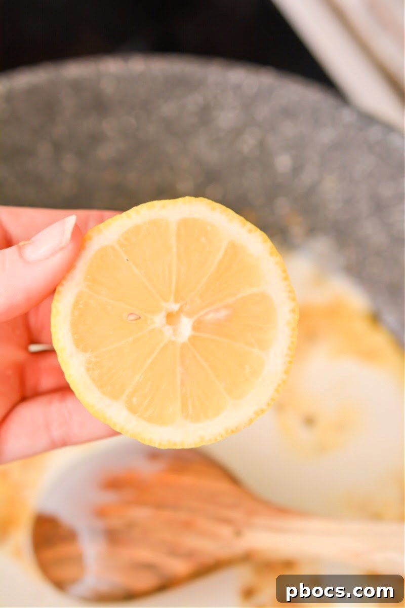 Ultimate Creamy Keto Garlic Shrimp 15 Close-up of the rich and creamy sauce thickening