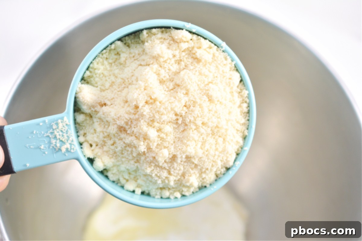 Adding almond flour and egg to keto fruit pizza dough