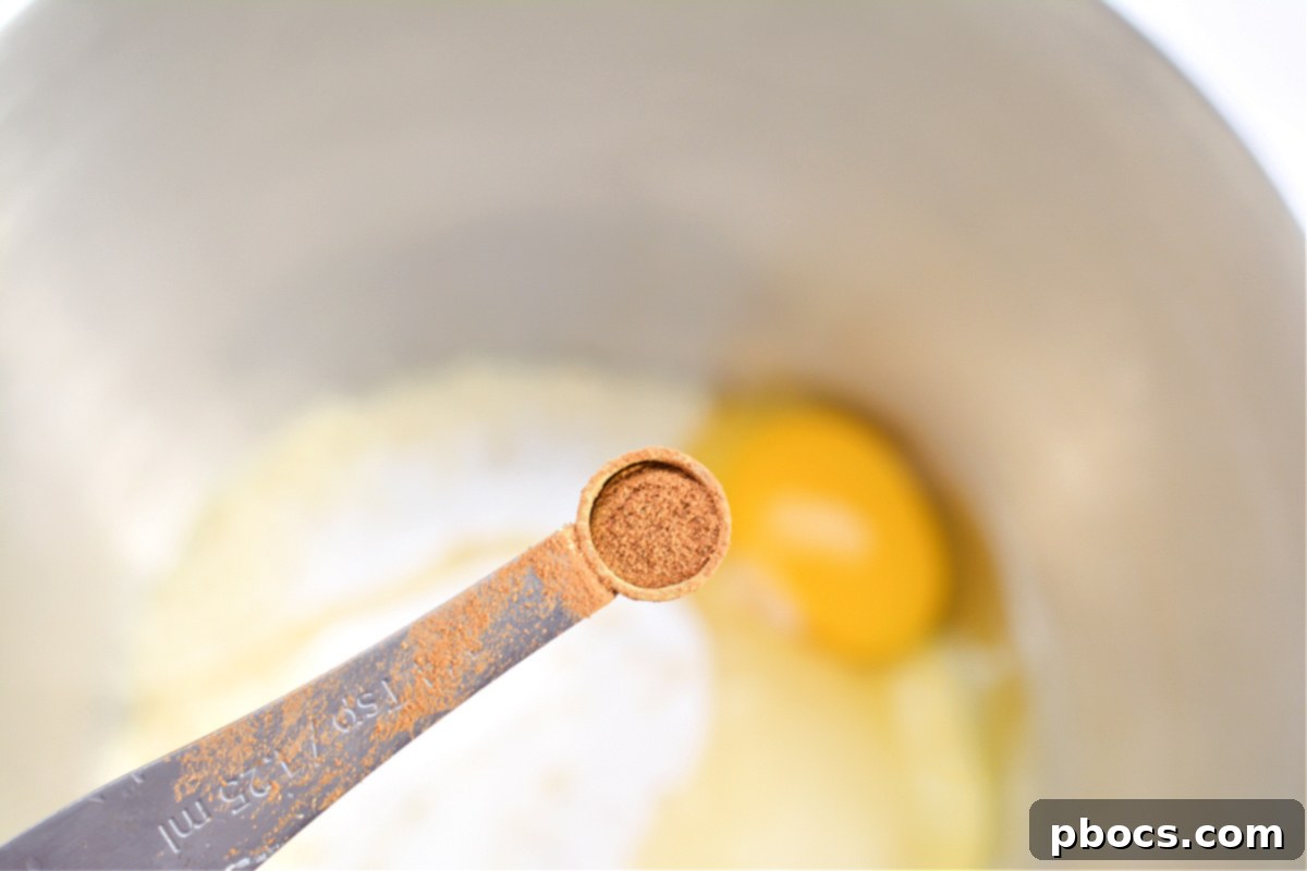 Mixing keto fruit pizza dough ingredients
