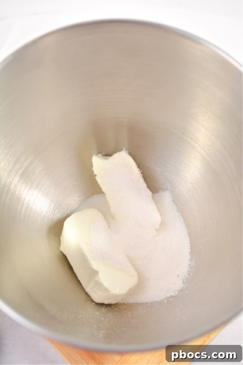 Mixing ingredients for keto cream cheese icing