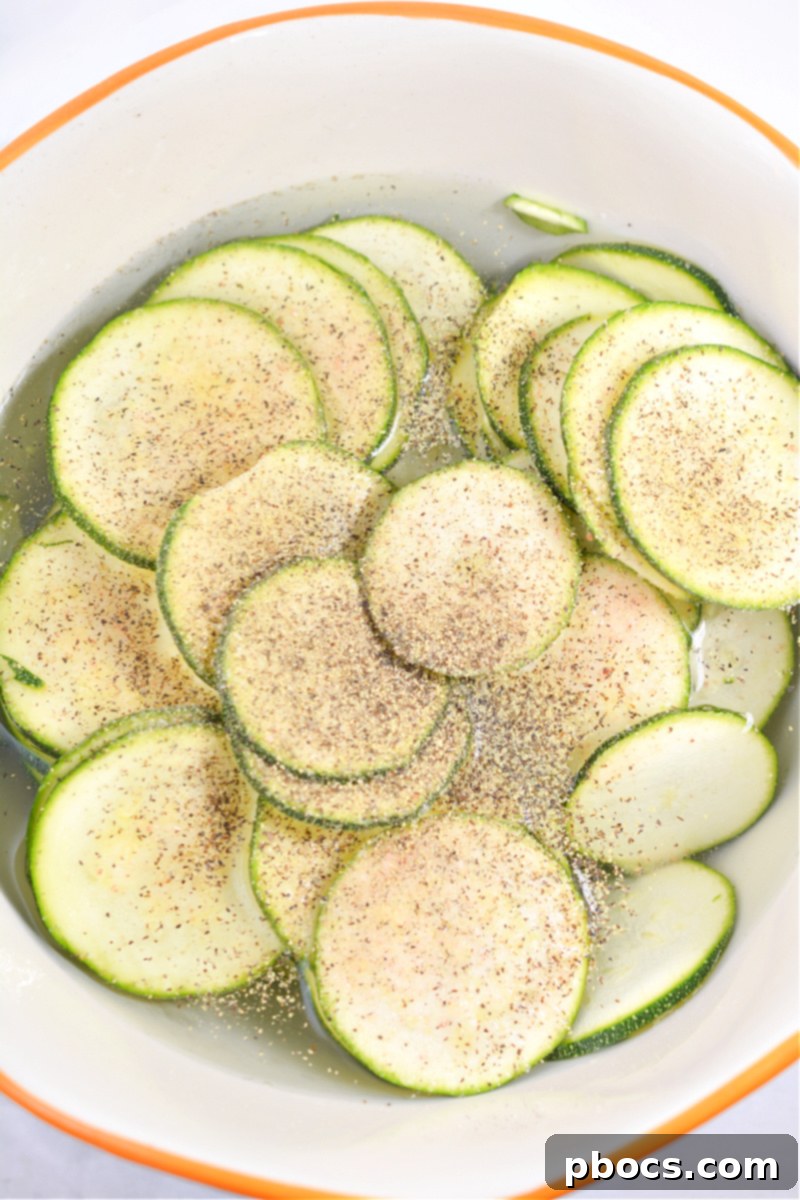 Seasoning zucchini chips