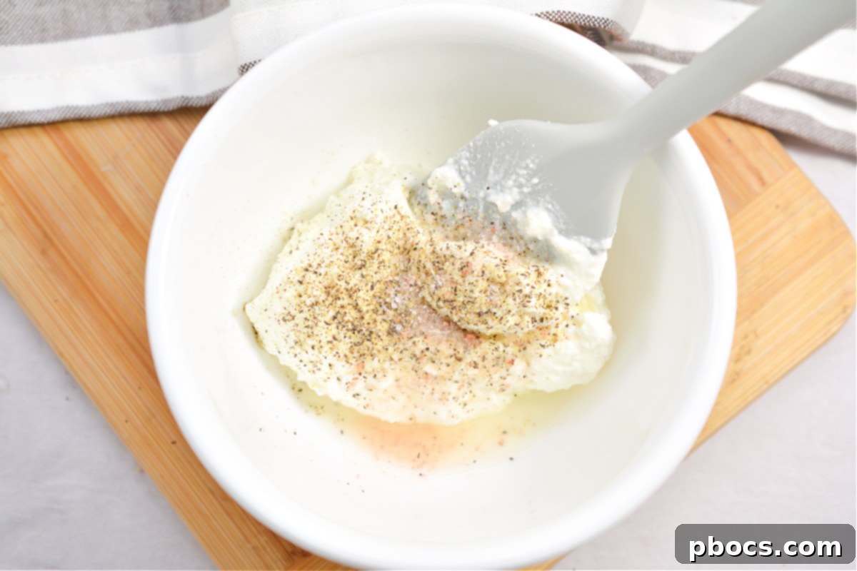 Close-up of the ricotta mixture, showing its smooth and creamy texture.