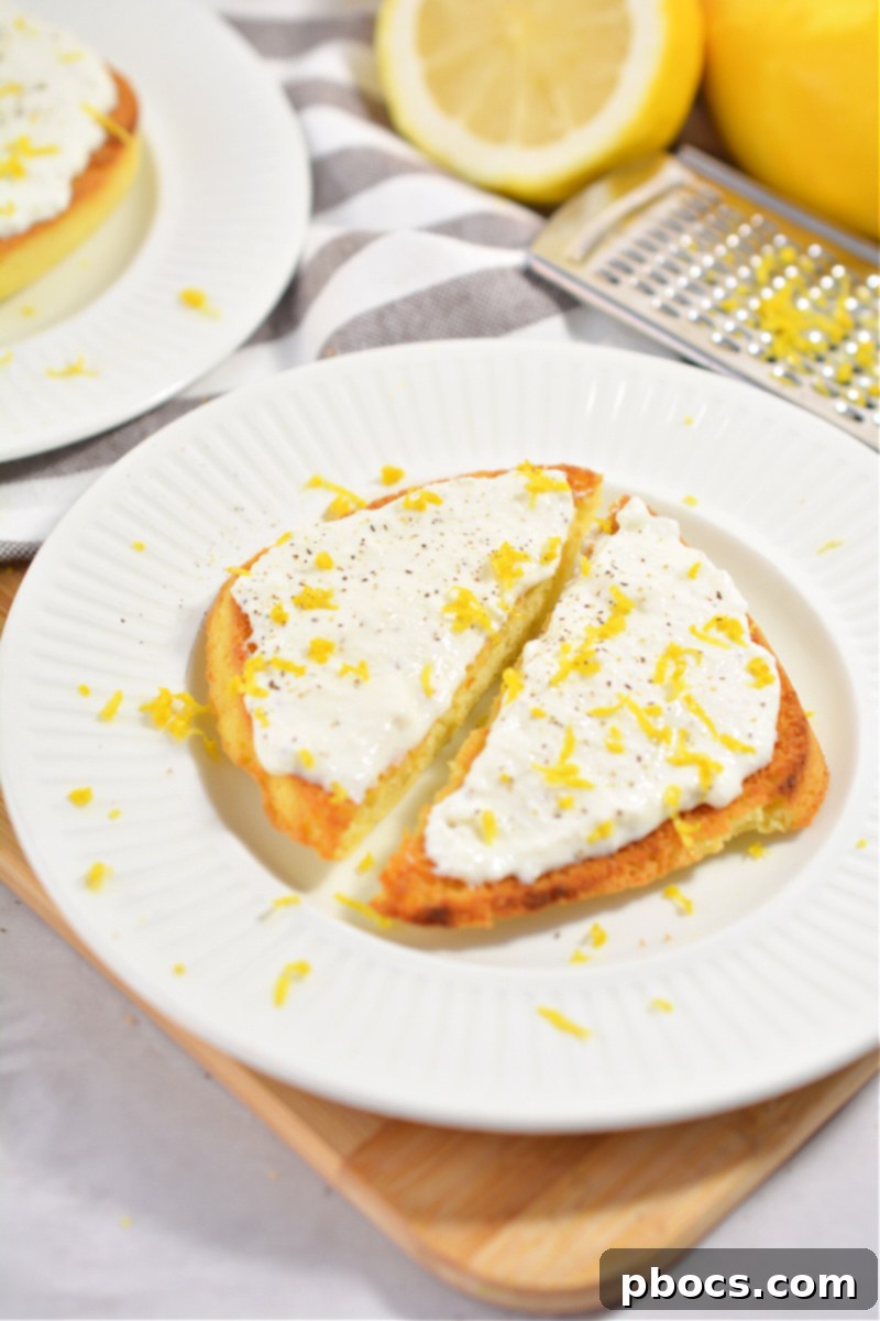 Beautifully arranged Keto Ricotta Toast slices on a white plate, ready to be served.