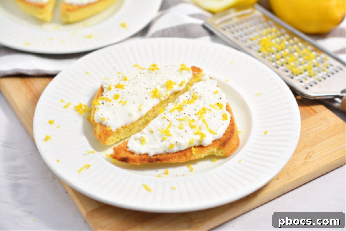 Keto Ricotta Toast garnished with a light sprinkle of lemon zest, ready to be enjoyed.