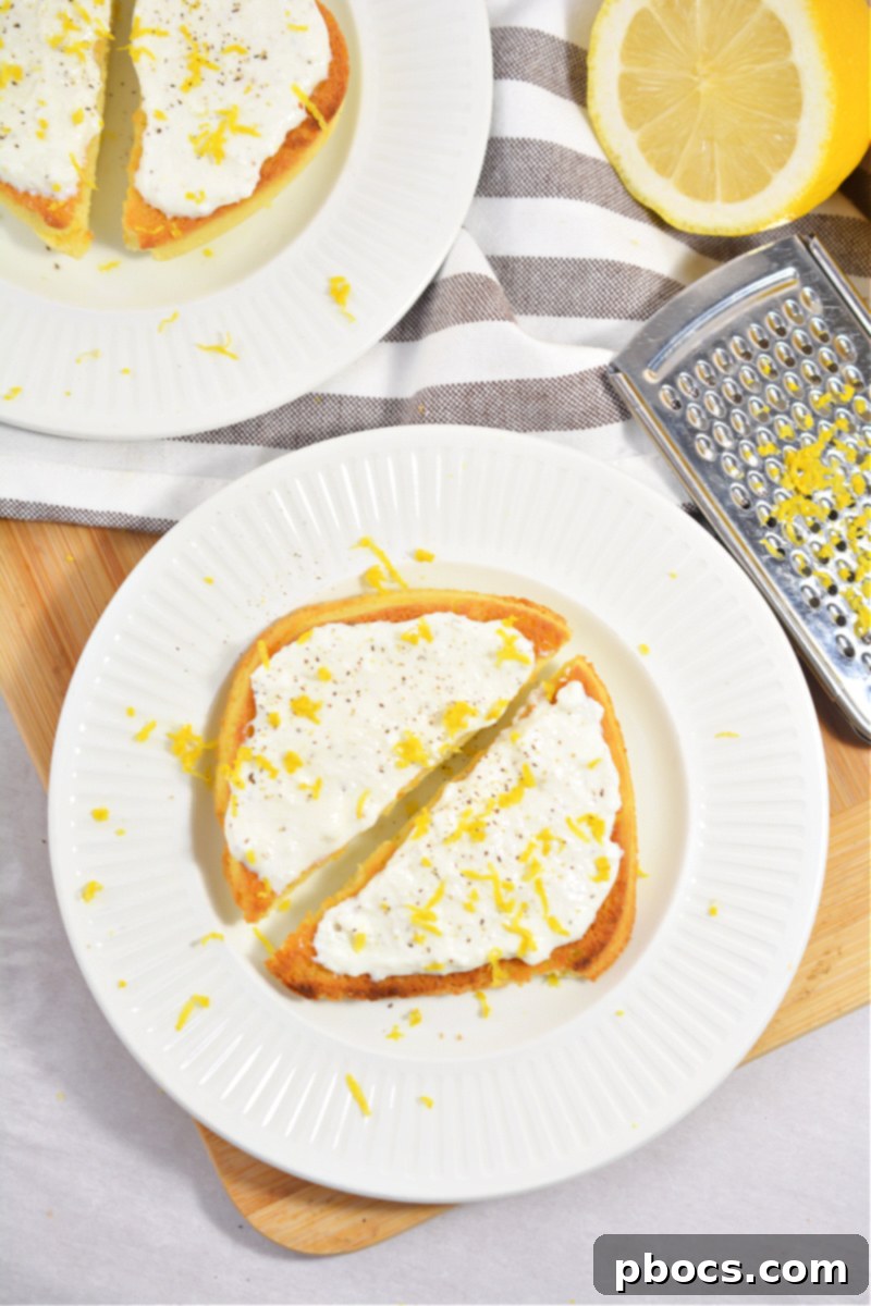 Keto 90-Second Bread being sliced, showing its fluffy texture.