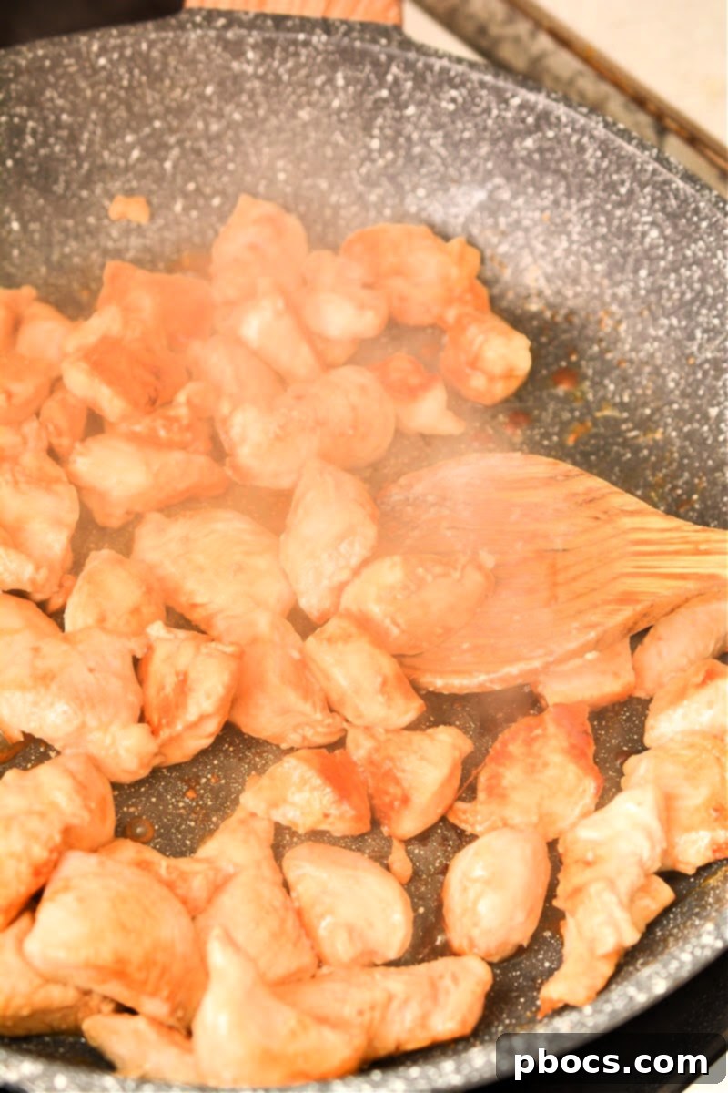 Keto Moo Goo Gai Pan Stir Fry 11 Step 3: Cooking chicken in a hot skillet.