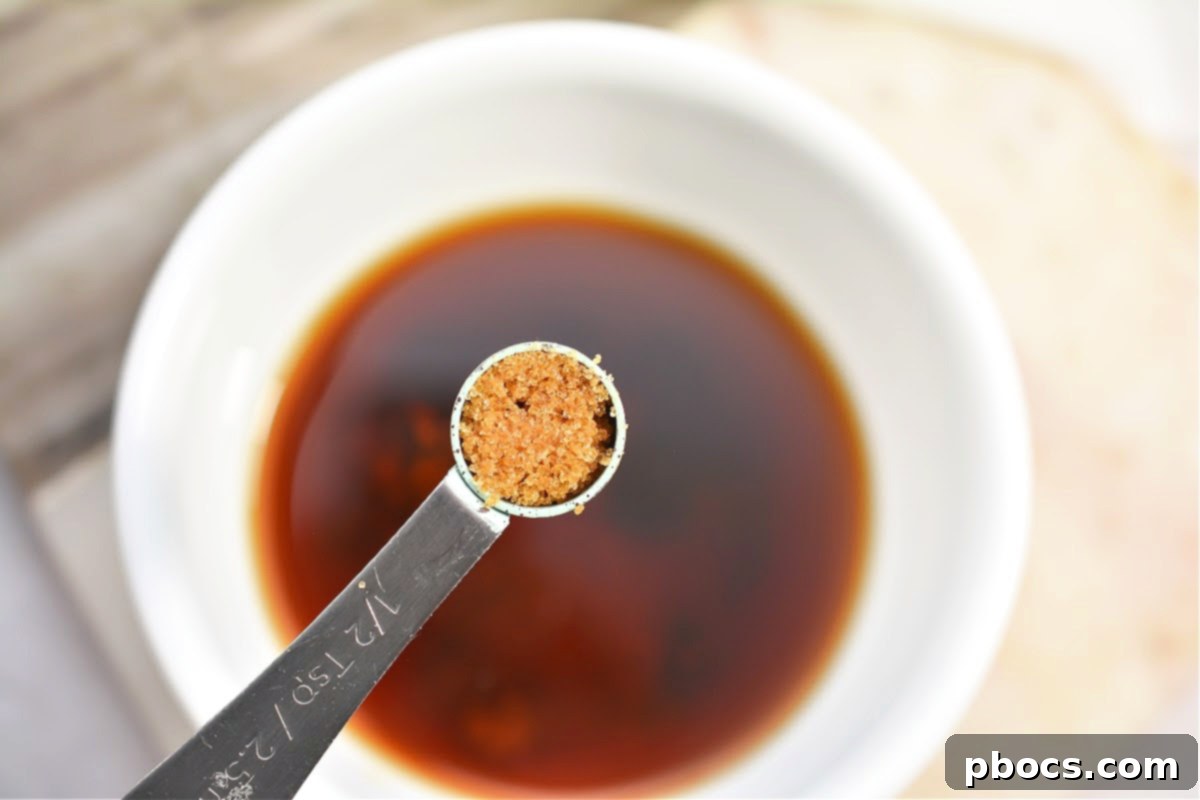 Keto Moo Goo Gai Pan Stir Fry 15 Step 7: Mixing sauce ingredients in a bowl.