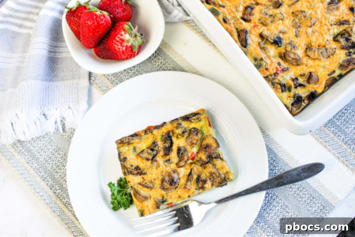 Savory Keto Veggie Morning Bake 9 A close-up of the Keto Breakfast Bake, highlighting the golden crust and bubbling cheese, still in the baking dish