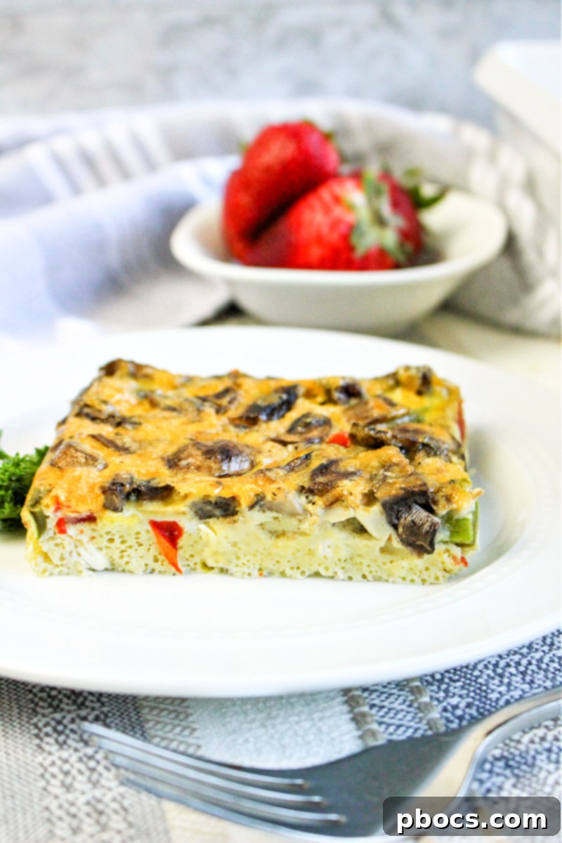 Savory Keto Veggie Morning Bake 10 Meal prepped Keto Breakfast Bake, sliced into individual portions in a storage container