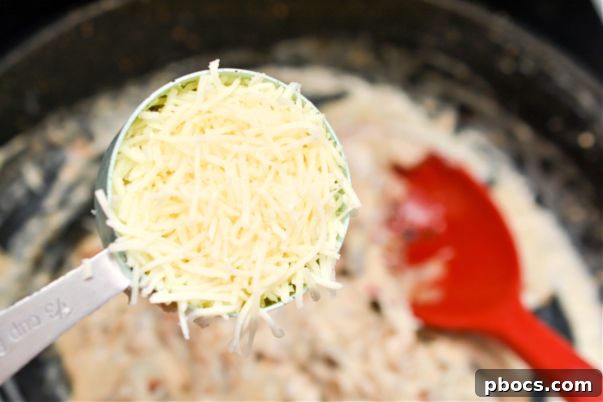 Mixing Cheese into Spinach Filling