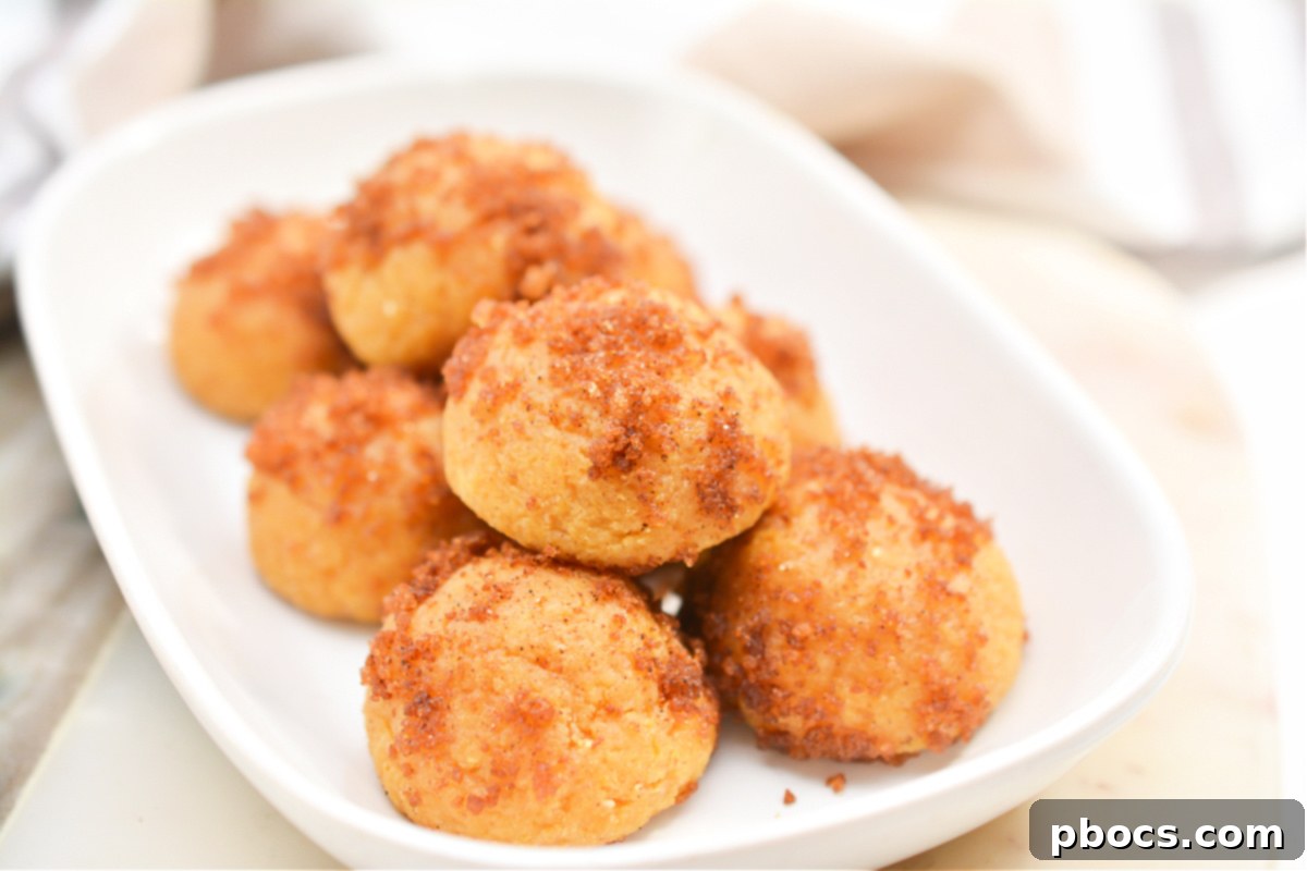 Keto Pumpkin Spice Donut Holes arranged on a small plate as a snack