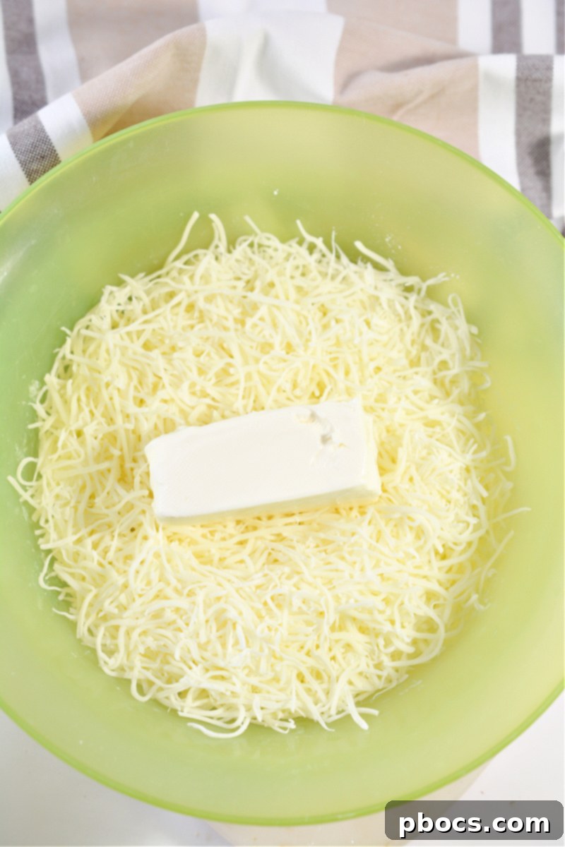 Mozzarella and cream cheese melting in a bowl