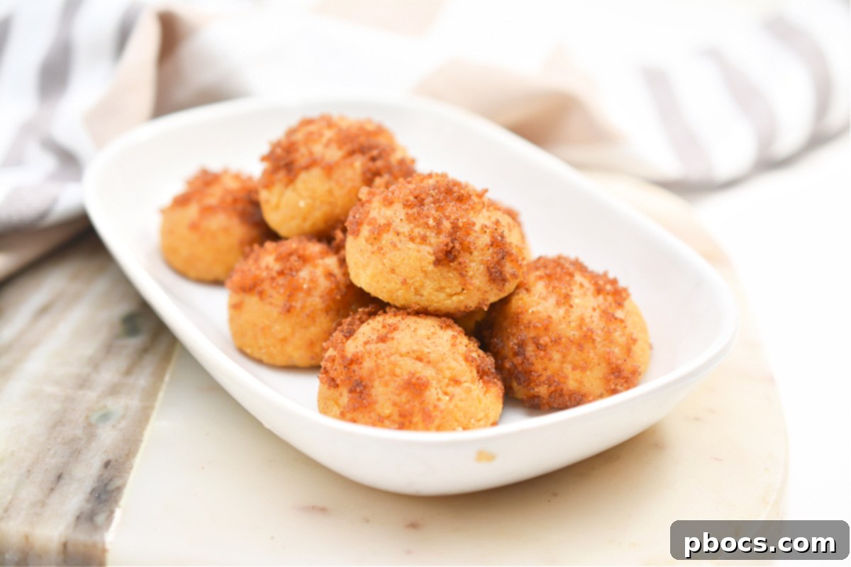 Plate of Keto Pumpkin Spice Donut Holes with various toppings