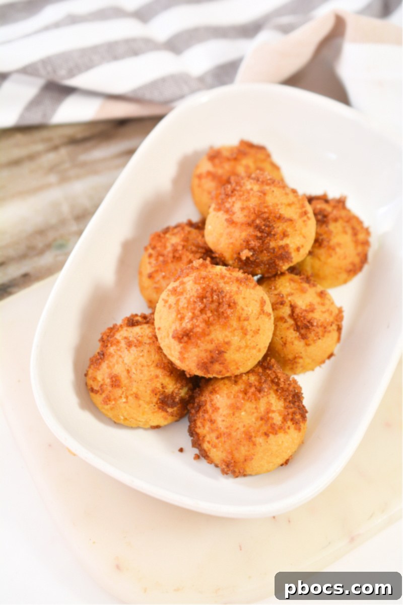 Assortment of Keto Pumpkin Spice Donut Holes with various garnishes