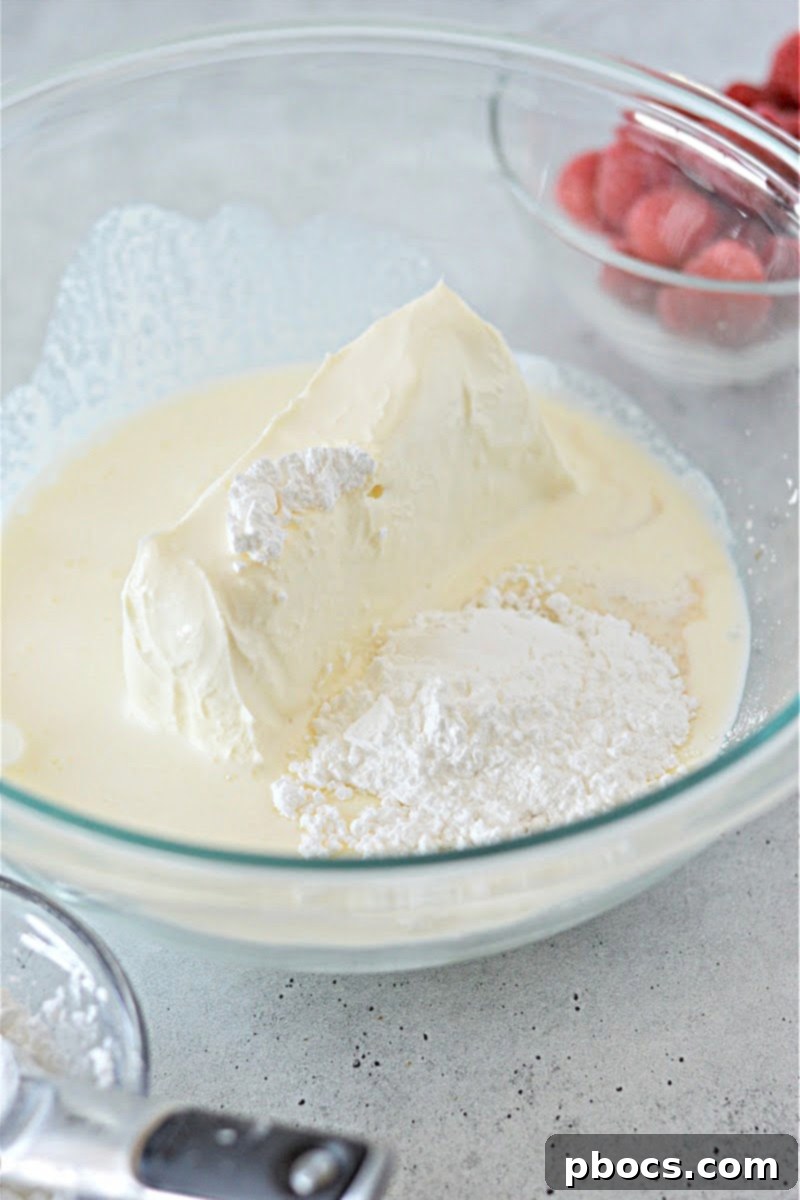 Mixing ingredients for Keto Cheesecake Fluff in a bowl until smooth