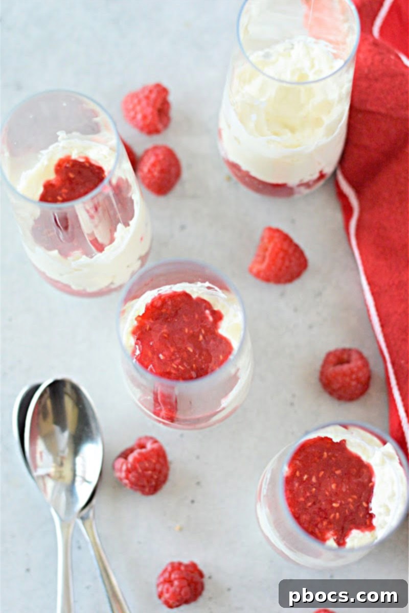 Individual serving of Keto Cheesecake Fluff in a small glass jar, ready for a party