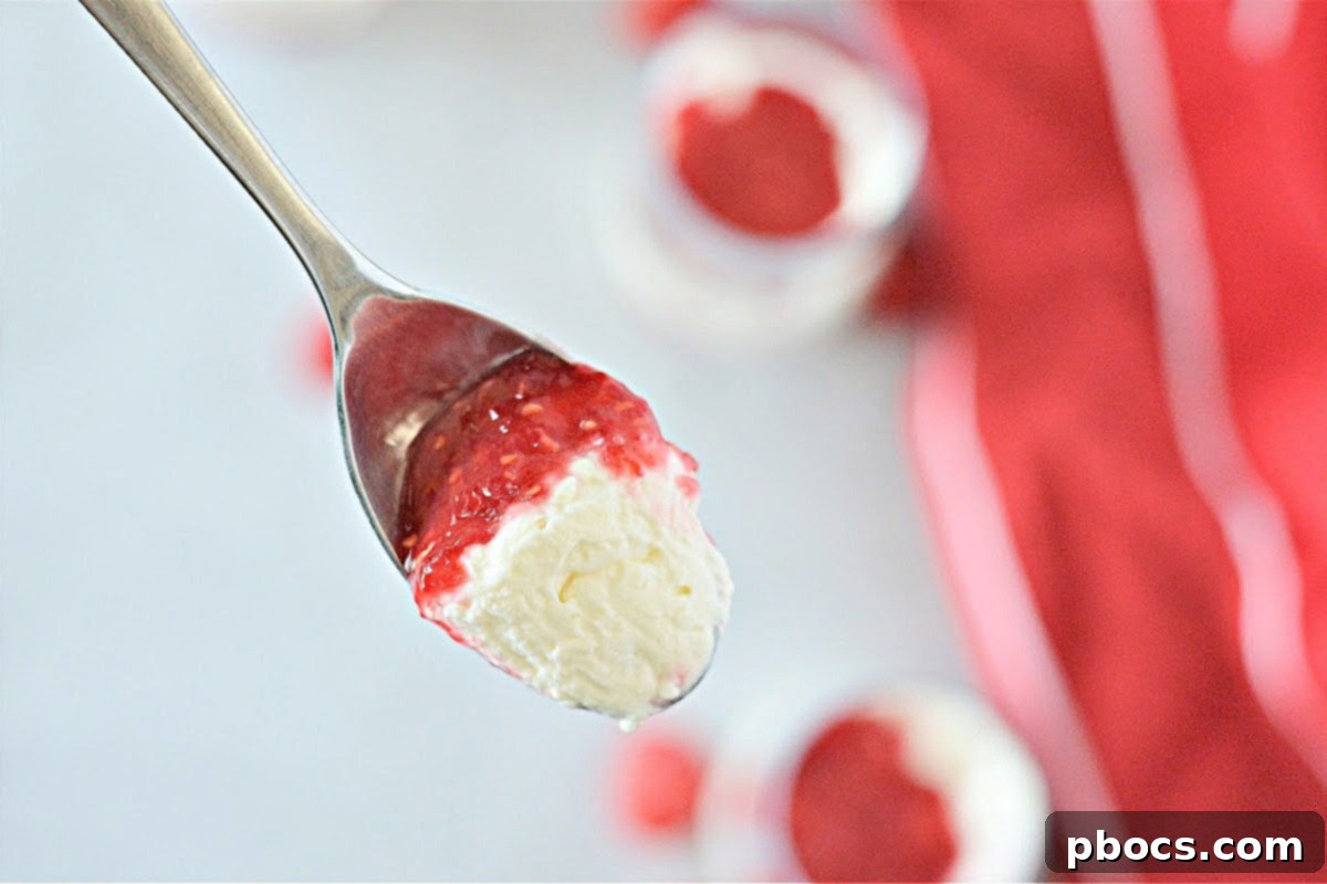 Assortment of individual Keto Cheesecake Fluff jars with different toppings