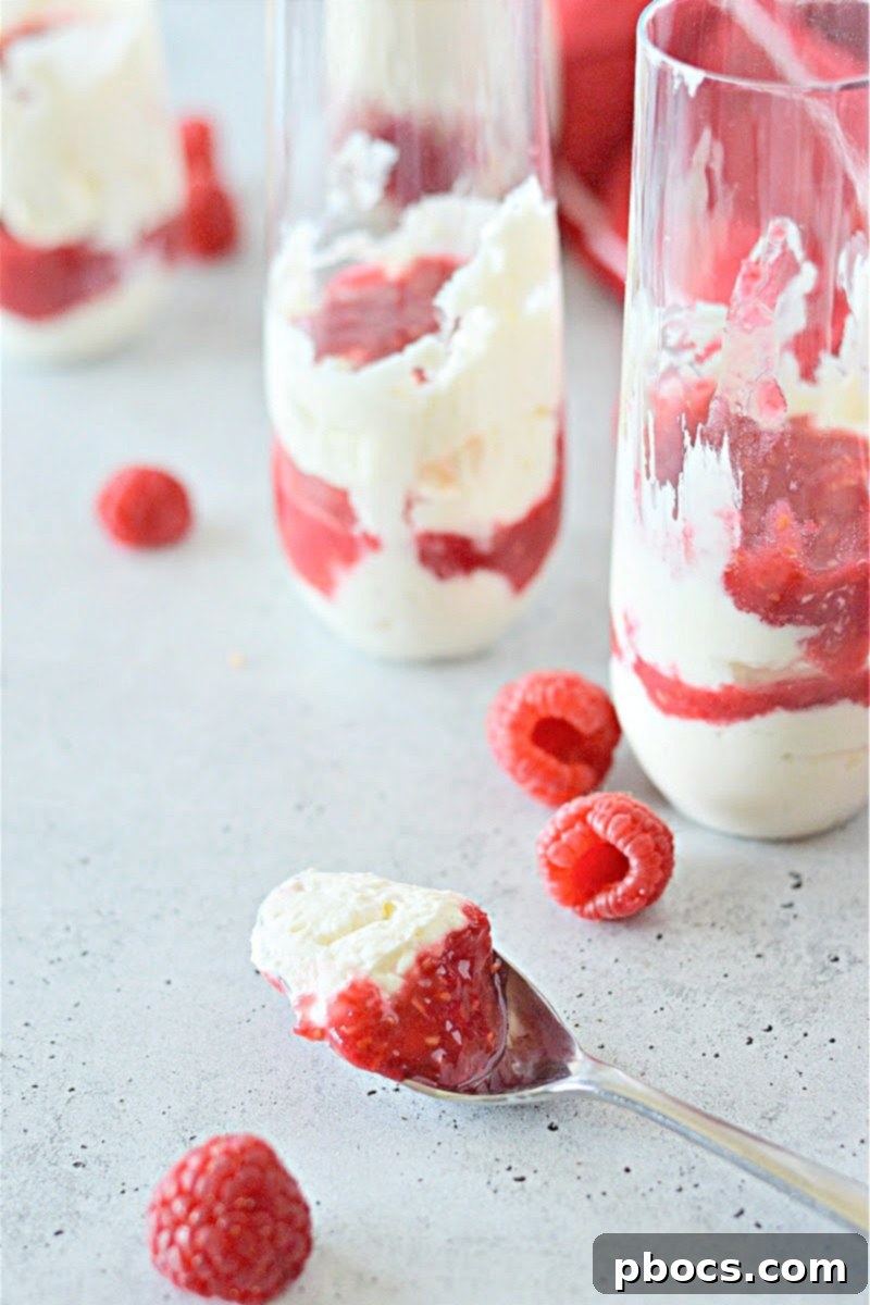 Close-up of fluffy keto cheesecake in a glass, ready for toppings