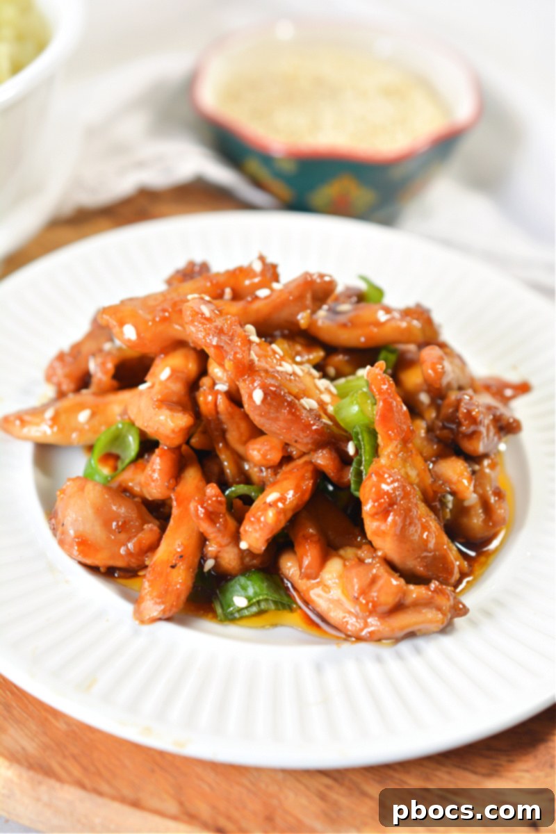 Meal prep containers with Sticky Keto Garlic Chicken, ready for future meals.