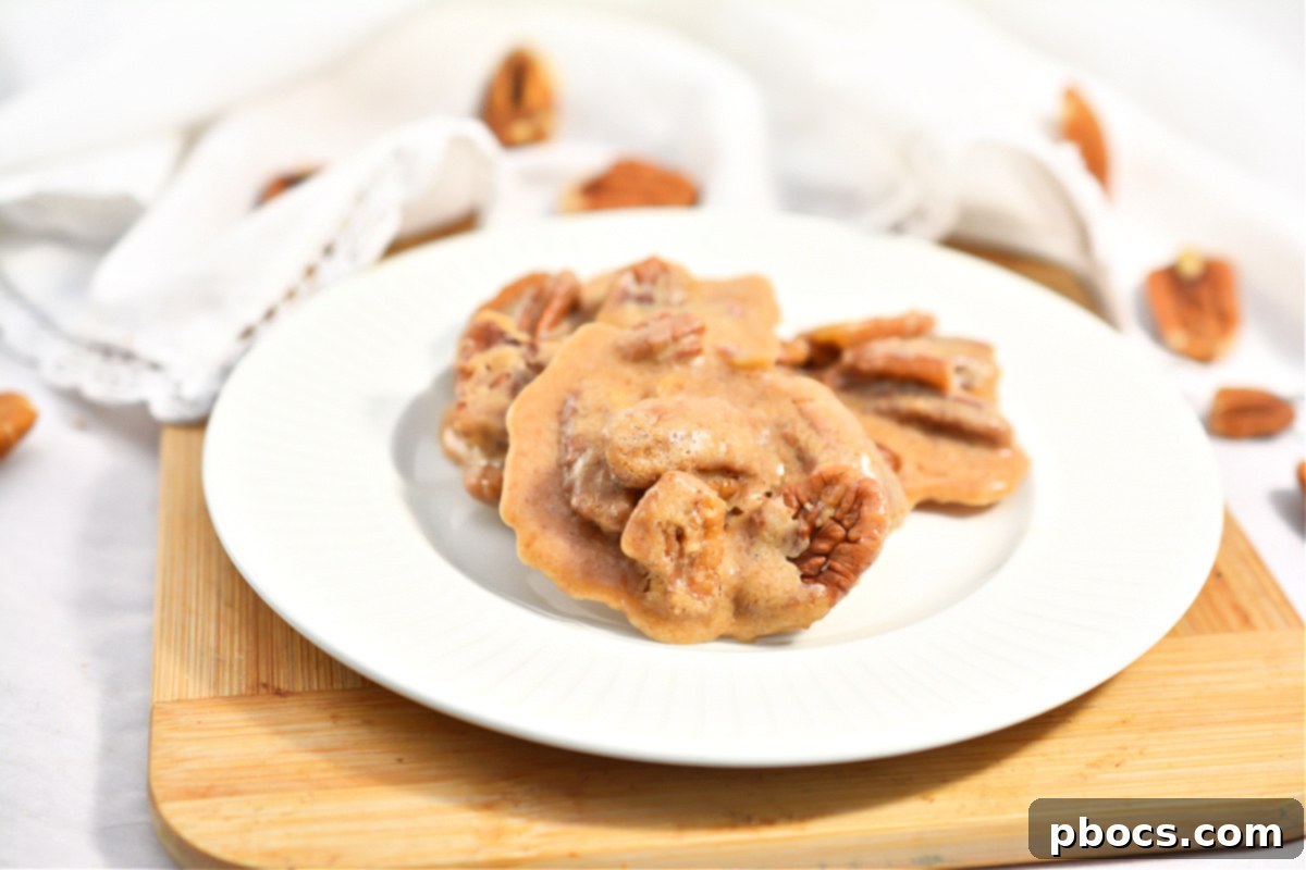 Keto Pecan Pralines crumbled over keto ice cream