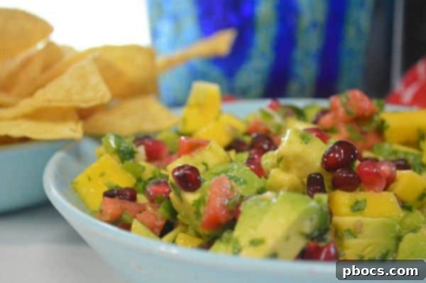 Refreshing Avocado, Mango and Pomegranate Salad 2 Vibrant Avocado, Mango, and Pomegranate Salad, a delightful mix of fresh flavors