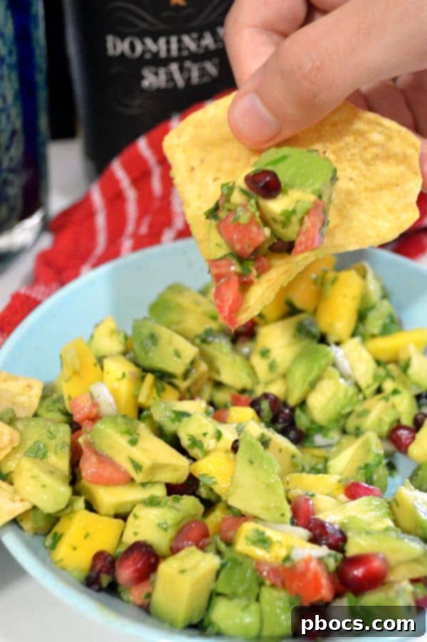 Refreshing Avocado, Mango and Pomegranate Salad 5 Avocado, Mango & Pomegranate Salad as a side dish, highlighting its fresh appeal