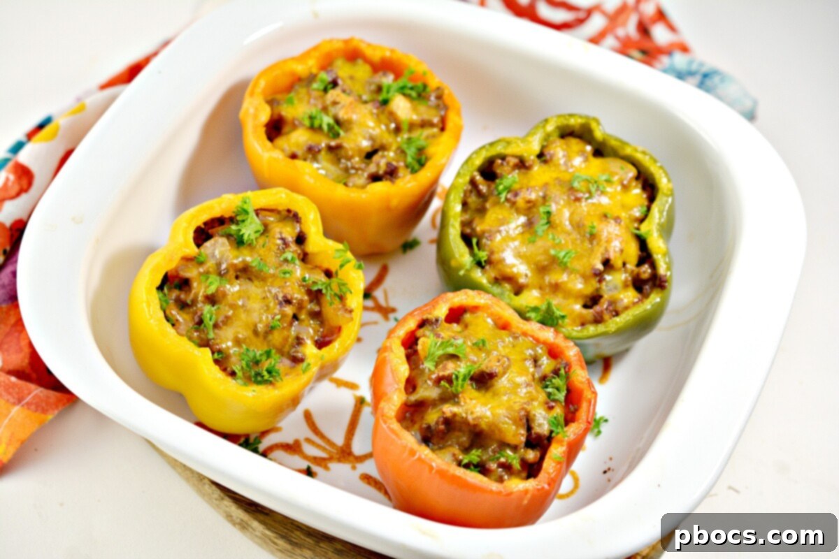 Keto Sloppy Joe Bell Pepper Boats 3 Two halves of Keto Sloppy Joe Stuffed Peppers showcasing the rich filling
