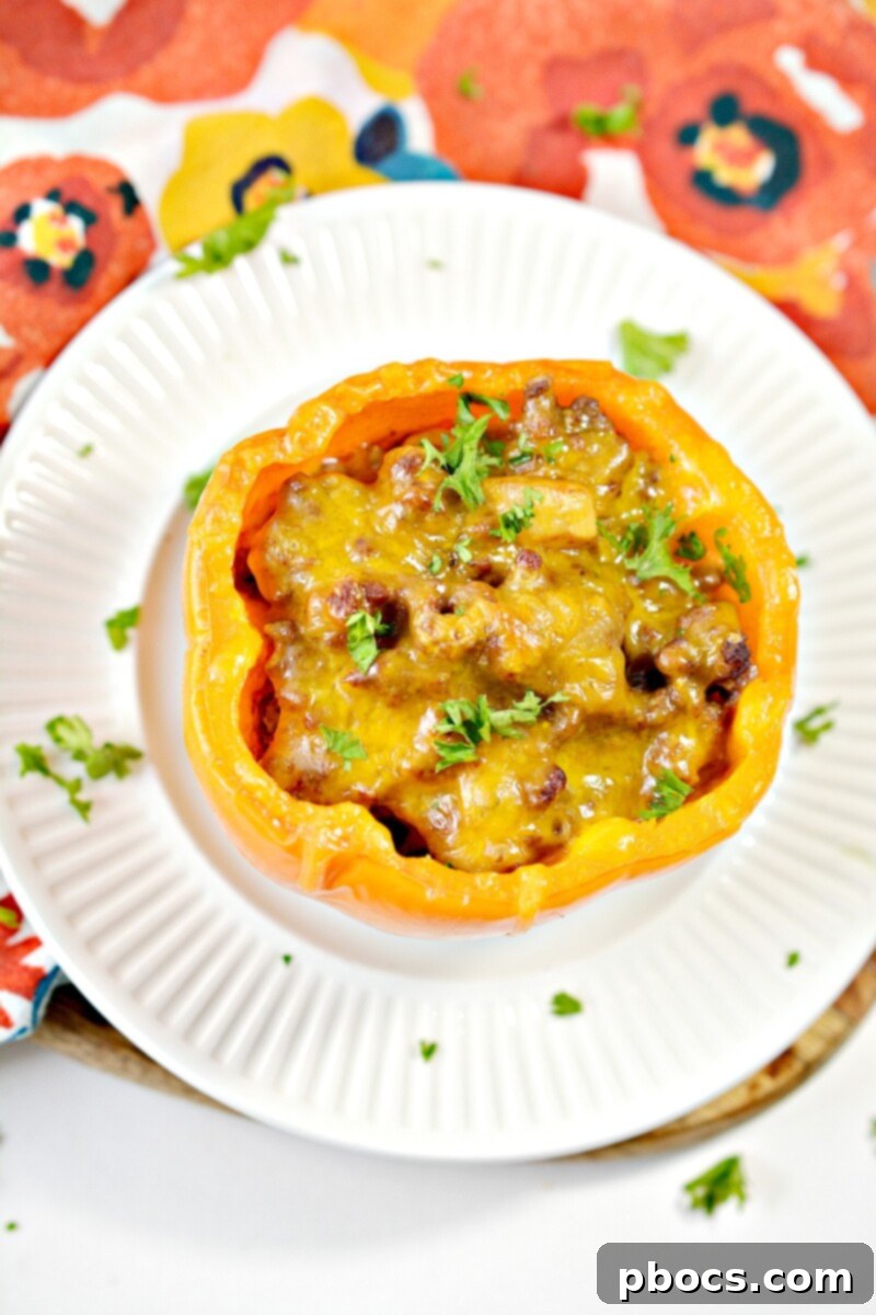 Keto Sloppy Joe Bell Pepper Boats 8 Keto Sloppy Joe Stuffed Peppers served with a side of green vegetables