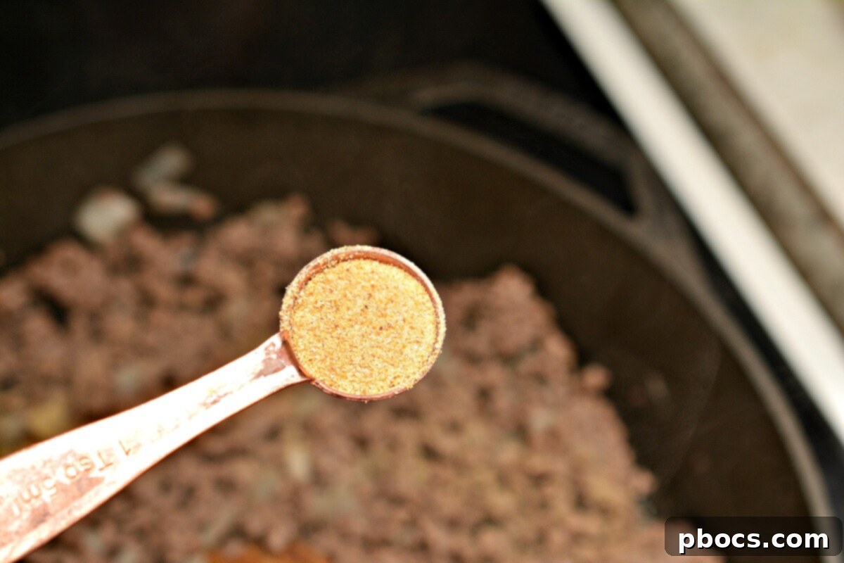 Keto Sloppy Joe Bell Pepper Boats 9 Sautéing ground beef and chopped onions in a skillet