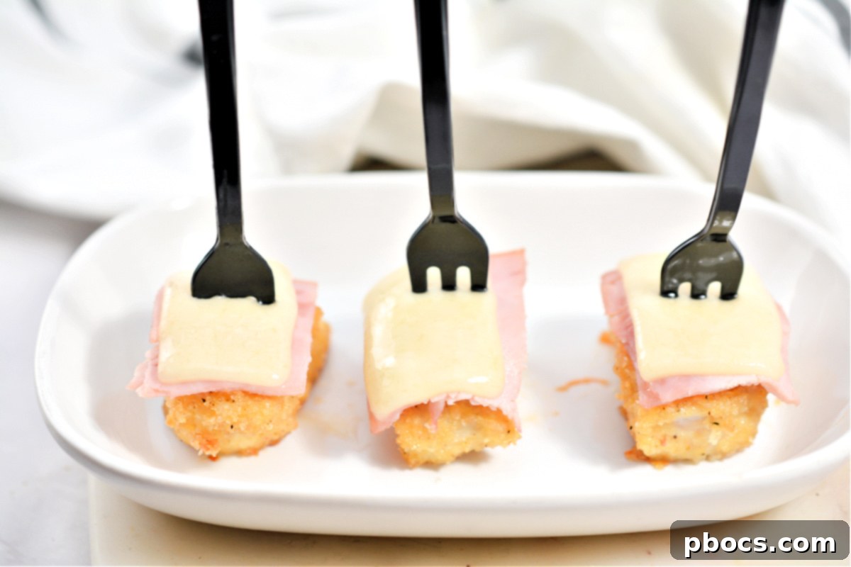 Keto Cordon Bleu Chicken Poppers 3 A close-up shot of Keto Chicken Cordon Bleu Bites showing their golden, crispy exterior and rich filling.