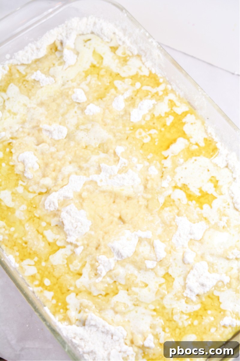 Drizzling melted butter over the cake mix layer