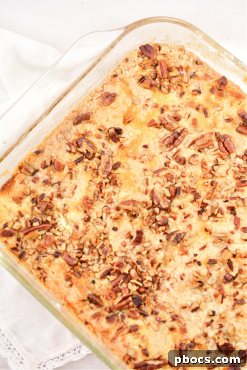 Golden brown Keto Pumpkin Pecan Dump Cake fresh out of the oven