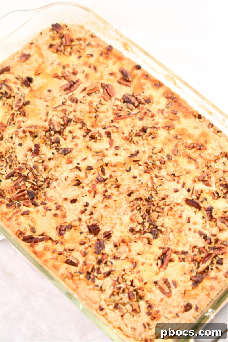 A slice of Keto Pumpkin Pecan Dump Cake ready to be served