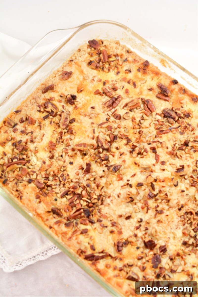 Rustic and gooey Keto Pumpkin Pecan Dump Cake freshly baked