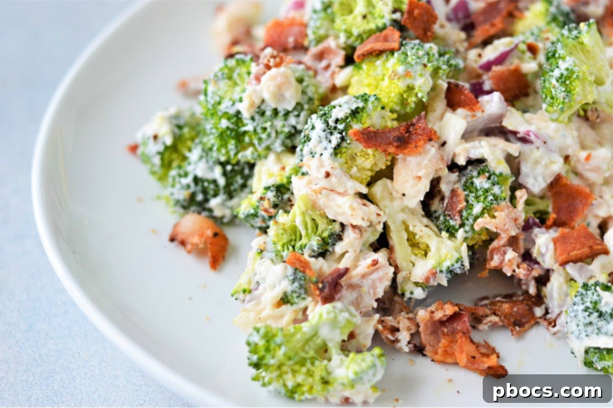 Close-up of Low Carb Chicken Broccoli Salad with red onion