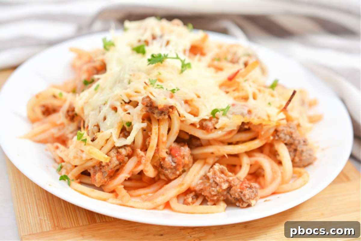 Rich Keto Bolognese Sauce simmering for baked spaghetti
