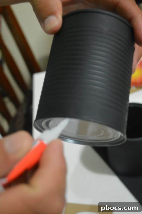 Step 5: Gluing painted cans onto the foam board base