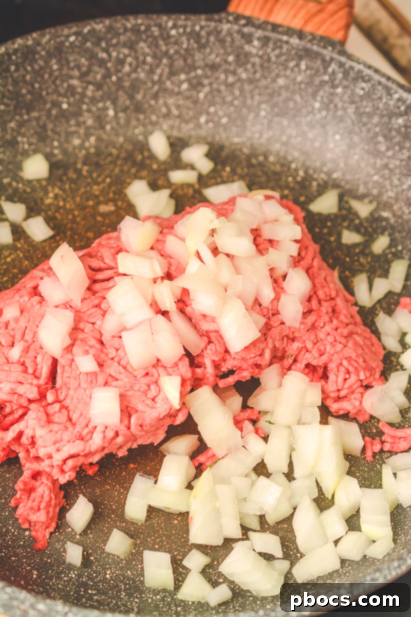 Keto Empanada Delights 11 Mixing Almond Flour, Egg, and Baking Powder into Cheese Dough