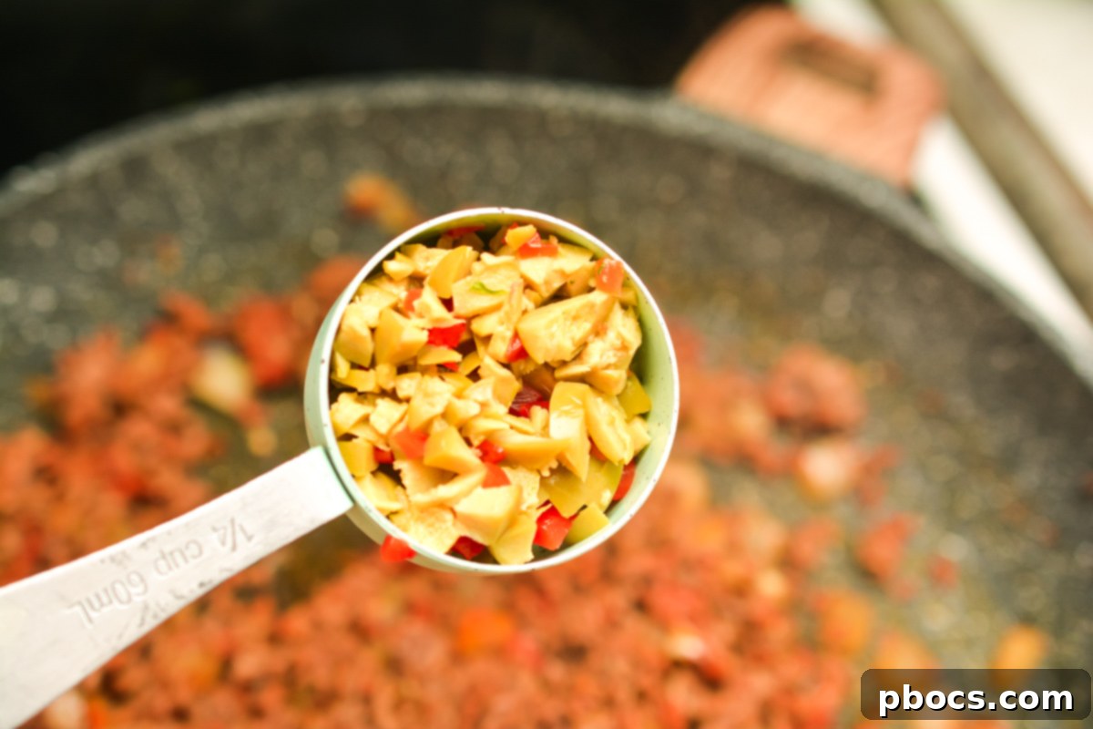 Keto Empanada Delights 13 Adding Spices and Garlic to Beef Empanada Filling