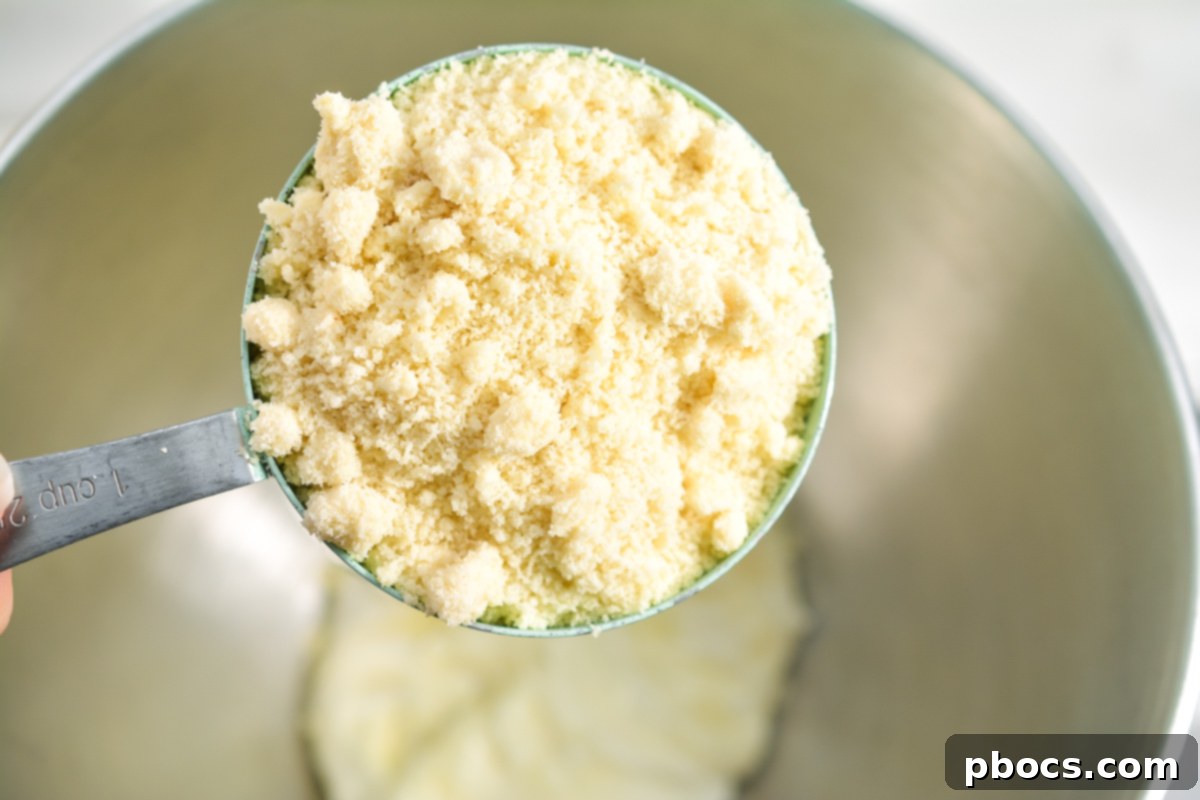 Keto Empanada Delights 10 Transferring Melted Cheese to a Mixing Bowl