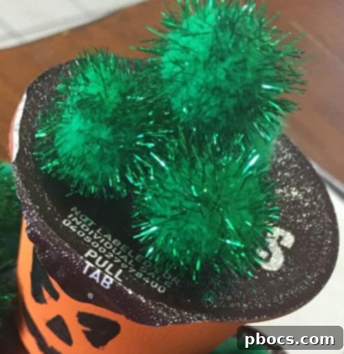 Finished DIY Pumpkin Treats with Hershey's Pudding Packs, lined up in a row