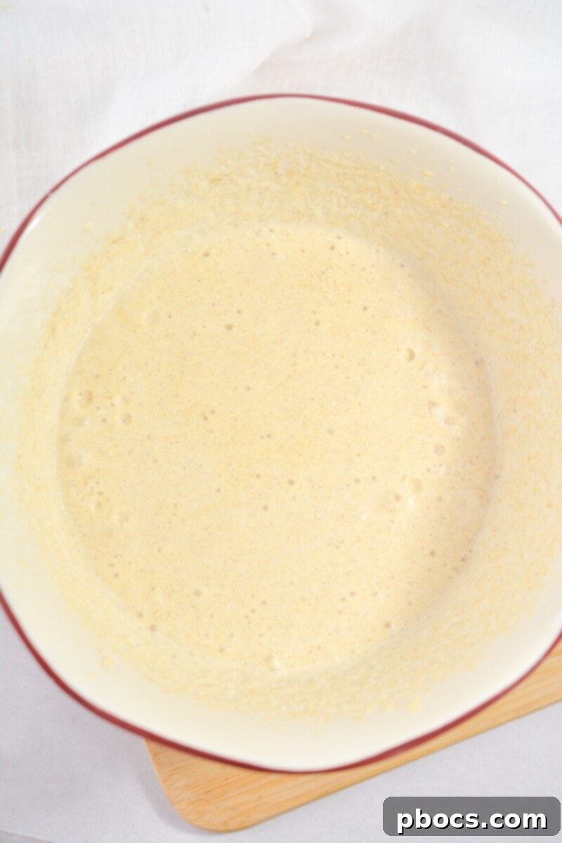 Frothing the pumpkin cream mixture for Keto Pumpkin Cold Brew.