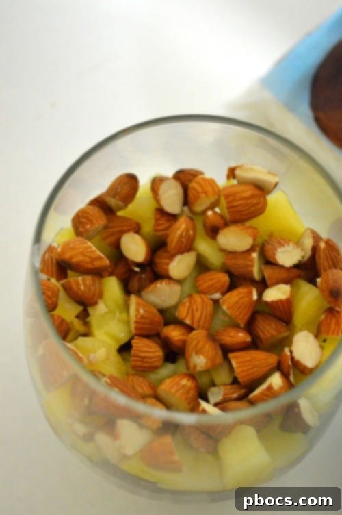 Layer of pineapple and almonds