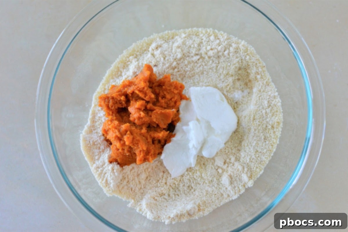 Adding wet ingredients to dry ingredients for breadstick dough