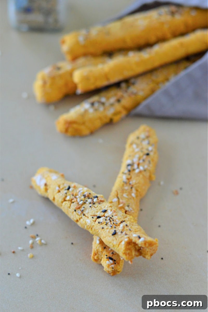 Delicious Low Carb Everything Bagel Breadsticks With Pumpkin being enjoyed with a meal